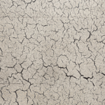 A close up of the cracked concrete surface