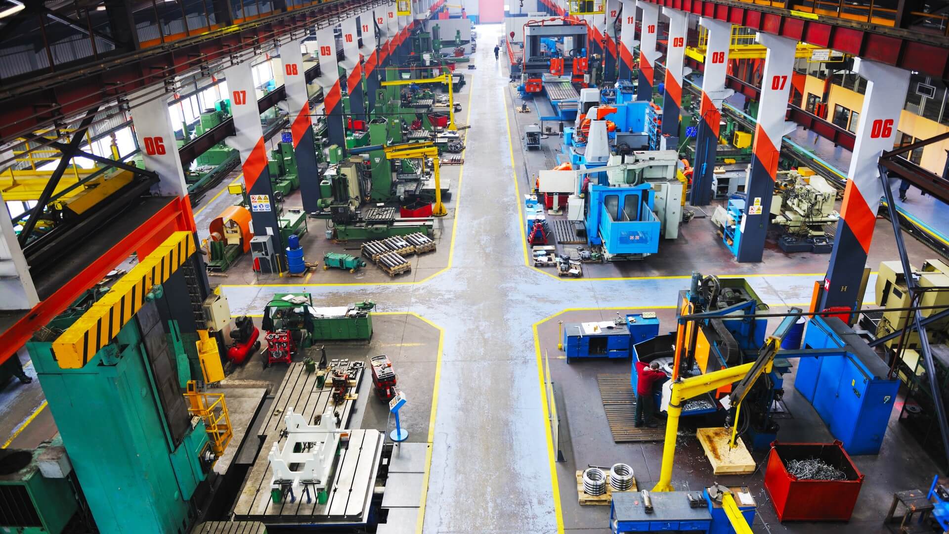 A large warehouse filled with machines and machinery.