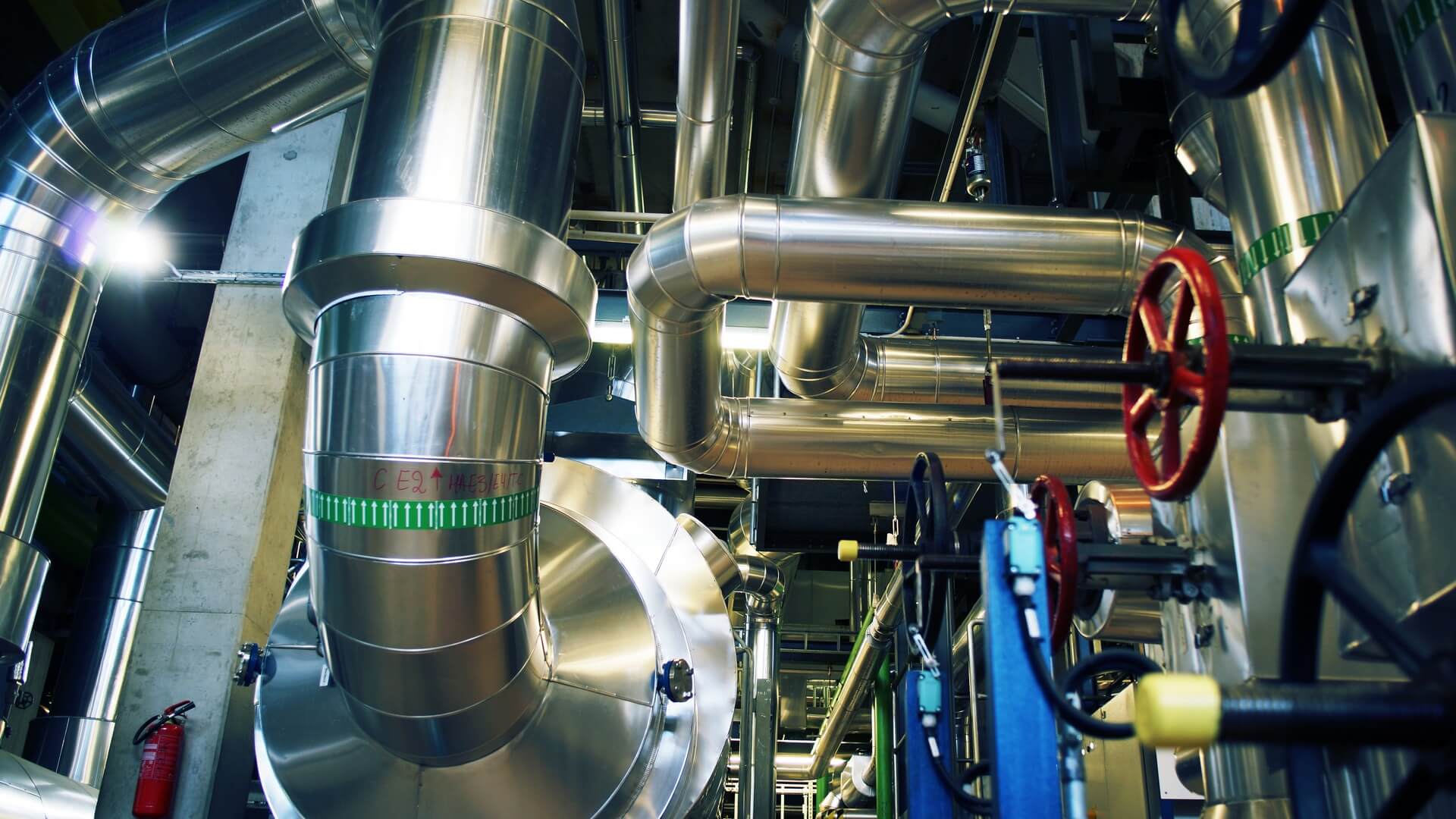 A large industrial area with pipes and valves.