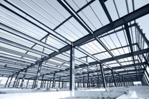 A large metal structure with many windows and beams.